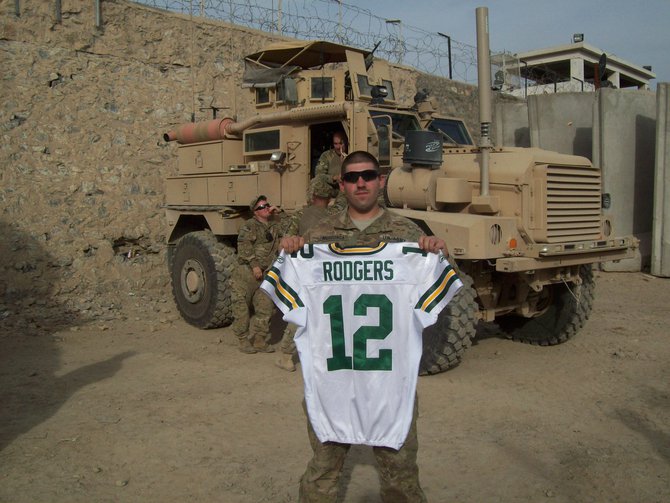Aaron Rodgers game-warn jersey donated by the Packers. This was from the Packers vs. Falcons playoff game last season. The U.S. Soldiers and even Afghanistan authorities are going to sign it for Maino to bring back and give to the Packers. Maybe Aaron will wear it again for the playoffs this year!!