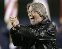 Singer Bob Seger reacts after performig America the Beautiful before Game 1 in Major League Baseball's World Series in Detroit