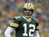 Green Bay Packers' Aaron Rodgers checks the clock against the Tampa Bay Buccaneers in the second half during their NFL football game in Gree