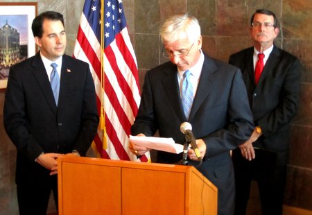 Collaborative Consulting president and CEO Bill Robichaud (center) announces he will create 200 jobs in Wausau over the next three years Collaborative Consulting president and CEO Bill Robichaud (center) announces he will create 200 jobs in Wausau over the next three years