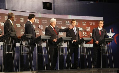 Cain, Romney, Perry and Santorum look on as Gingrich makes a point during a South Carolina Republican party presidential debate in Spartanbu Cain, Romney, Perry and Santorum look on as Gingrich makes a point during a South Carolina Republican party presidential debate in Spartanbu