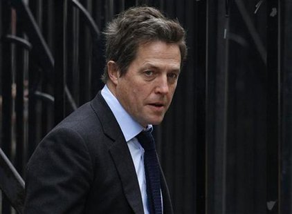 British actor Hugh Grant arrives at the Leveson Inquiry at the High Court in central London, British actor Hugh Grant arrives at the Leveson Inquiry at the High Court in central London,