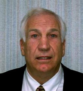 Former Penn State football Defensive Coordinator Sandusky is pictured in police photograph