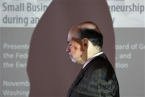 Federal Reserve Chairman Ben Bernanke is pictured in front of a projection screen after delivering opening remarks at a conference in Washin Federal Reserve Chairman Ben Bernanke is pictured in front of a projection screen after delivering opening remarks at a conference in Washin