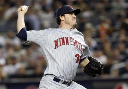 Minnesota Twins' Nathan pitches against the New York Yankees during their MLB American League Division Series playoff baseball game in New Y