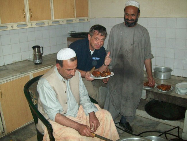 I hope the guys in the kitchen didn't mind...I did give them a
few tips during the process. I'm not positive as to what they were
saying, but I believe they were discussing how much they appreciated my
input.