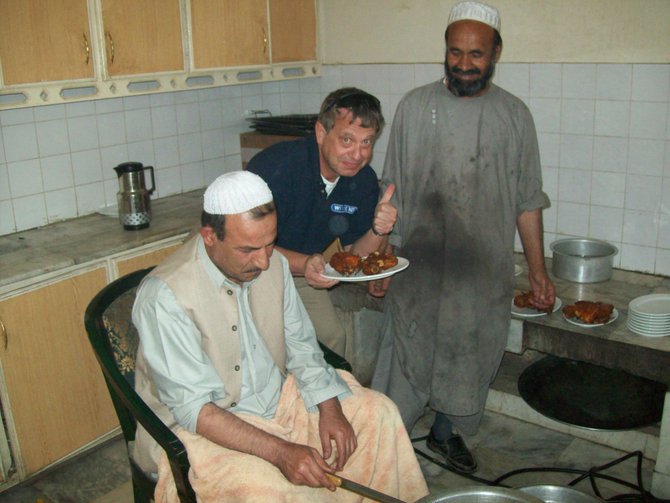 I hope the guys in the kitchen didn't mind...I did give them a
few tips during the process. I'm not positive as to what they were
saying, but I believe they were discussing how much they appreciated my
input.