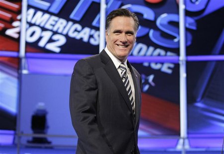 Republican presidential candidate former Massachusetts Governor Mitt Romney takes the stage at the start of the CNN GOP National Security de Republican presidential candidate former Massachusetts Governor Mitt Romney takes the stage at the start of the CNN GOP National Security de
