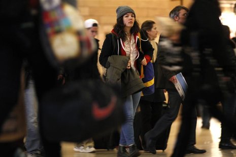 Travelers make their way to trains in Grand Central Station, New York Travelers make their way to trains in Grand Central Station, New York