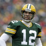 Green Bay Packers' Aaron Rodgers checks the clock against the Tampa Bay Buccaneers in the second half during their NFL football game in Gree Green Bay Packers' Aaron Rodgers checks the clock against the Tampa Bay Buccaneers in the second half during their NFL football game in Gree