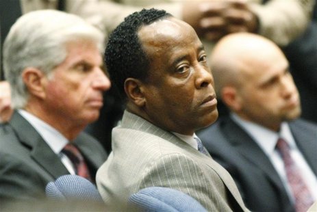 Dr. Conrad Murray remains expressionless next to J. Michael Flanagan after the jury returned with a guilty verdict in his involuntary mansla Dr. Conrad Murray remains expressionless next to J. Michael Flanagan after the jury returned with a guilty verdict in his involuntary mansla