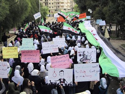 Demonstrators march against Syria's President Bashar al-Assad in Homs Demonstrators march against Syria's President Bashar al-Assad in Homs