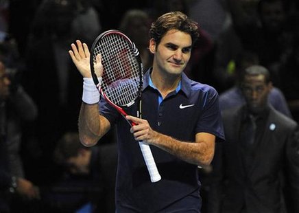 Federer of Switzerland reacts after winning his singles tennis match against Nadal of Spain at the ATP World Tour Finals in London Federer of Switzerland reacts after winning his singles tennis match against Nadal of Spain at the ATP World Tour Finals in London