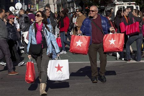 Black Friday shoppers cross 34th Street outside Macy's in Herald Square in New York Black Friday shoppers cross 34th Street outside Macy's in Herald Square in New York