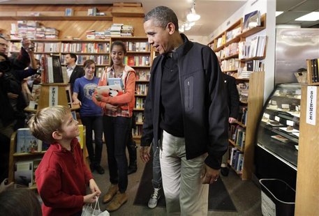 President Barack Obama with his daughters visit Kramerbooks President Barack Obama with his daughters visit Kramerbooks