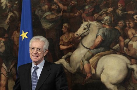 Italy's PM Monti smiles during a meeting with European Commissioner for Internal Market and Services Barnier in Rome Italy's PM Monti smiles during a meeting with European Commissioner for Internal Market and Services Barnier in Rome