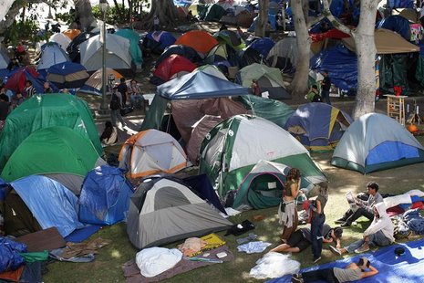 Occupiers continue to camp prior to an anticipated police raid to shut down the Occupy Los Angeles encampment outside City Hall in Los Angel