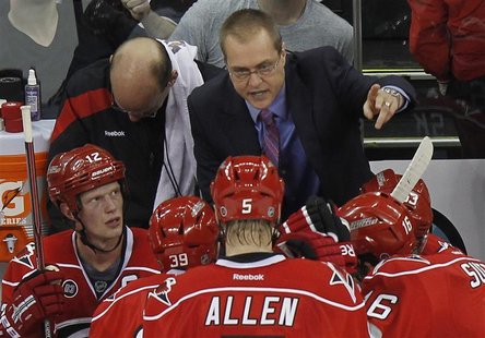 Carolina Hurricanes' head coach Maurice coaches his team during their NHL hockey game against the Toronto Maple Leafs in Raleigh, North Caro Carolina Hurricanes' head coach Maurice coaches his team during their NHL hockey game against the Toronto Maple Leafs in Raleigh, North Caro