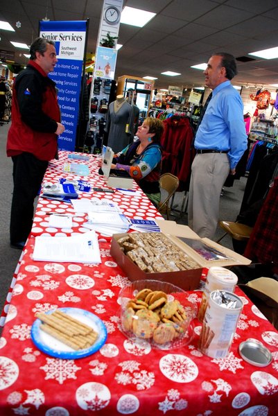 Lori Moore brings the Potluck Pals to Lee's Sporting Goods to raise money for Senior Services - the Pals raised $1325 - enough to provide 700 meals!