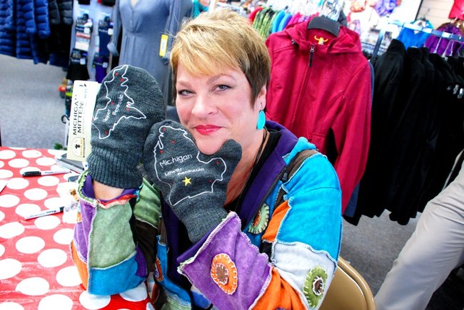 Lori Moore brings the Potluck Pals to Lee's Sporting Goods to raise money for Senior Services - the Pals raised $1325 - enough to provide 700 meals!
