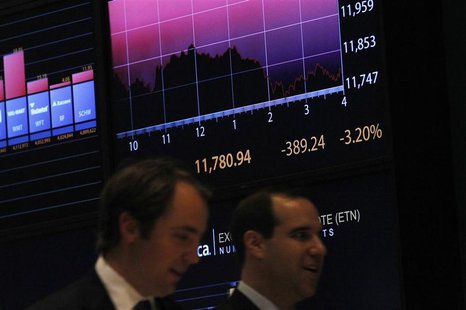 A screen shows the Dow Jones industrial average on the floor of the New York Stock Exchange A screen shows the Dow Jones industrial average on the floor of the New York Stock Exchange