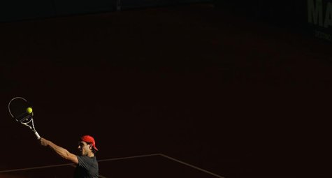 Spain's Nadal returns a ball during a training session for their upcoming Davis Cup final in Seville. Spain's Nadal returns a ball during a training session for their upcoming Davis Cup final in Seville.