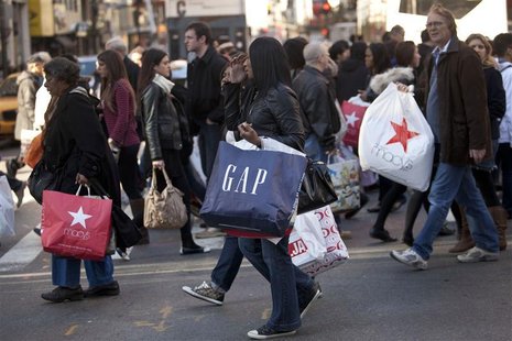 Black Friday shoppers cross 34th street, in Herald Square, in New York Black Friday shoppers cross 34th street, in Herald Square, in New York