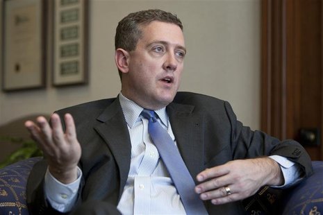 President and CEO of the Federal Reserve Bank of St. Louis James Bullard gestures during an interview at the Federal Reserve Bank of St. Lou President and CEO of the Federal Reserve Bank of St. Louis James Bullard gestures during an interview at the Federal Reserve Bank of St. Lou