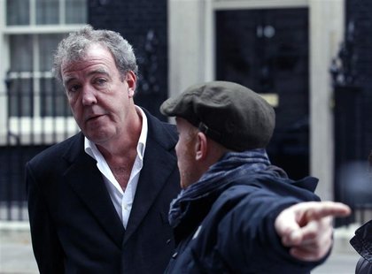 BBC automobile program Top Gear presenter Clarkson speaks with a member of his crew outside 10 Downing Street in London BBC automobile program Top Gear presenter Clarkson speaks with a member of his crew outside 10 Downing Street in London
