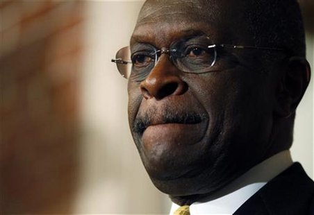 Republican presidential candidate and businessman Herman Cain listens to a question from a reporter during a news conference in Manchester, Republican presidential candidate and businessman Herman Cain listens to a question from a reporter during a news conference in Manchester,