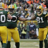 Green Bay Packers' B.J. Raji celebrates his touchdown with T.J. Lang and Andrew Quarless against the Tampa Bay Buccaneers during their NFL f Green Bay Packers' B.J. Raji celebrates his touchdown with T.J. Lang and Andrew Quarless against the Tampa Bay Buccaneers during their NFL f