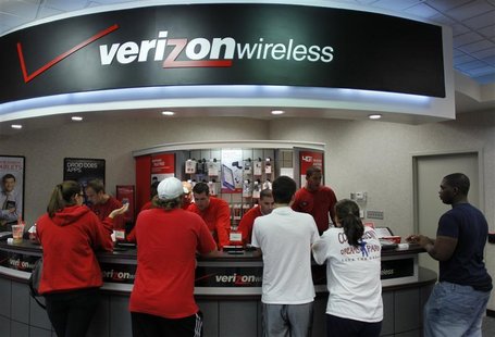 Customers purchase the iPhone 4 shortly after the phone went on sale with the Verizon Wireless network in Boca Raton Customers purchase the iPhone 4 shortly after the phone went on sale with the Verizon Wireless network in Boca Raton