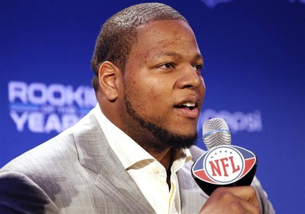 Suh of the Detroit Lions speaks after he received the Pepsi NFL Rookie of the Year award at a news conference in Dallas Suh of the Detroit Lions speaks after he received the Pepsi NFL Rookie of the Year award at a news conference in Dallas