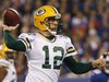 Green Bay Packers quarterback Rodgers throws a touchdown pass against the New York Giants in the first quarter during their NFL football gam