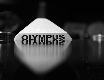 The Olympus logo on its camera is seen in this illustrative photograph taken in Tokyo The Olympus logo on its camera is seen in this illustrative photograph taken in Tokyo