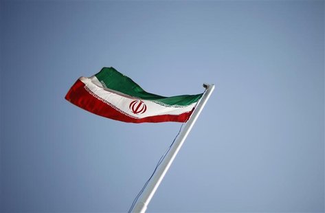 An Iranian national flag flutters during the opening ceremony of the 16th International Oil, Gas & Petrochemical Exhibition (IOGPE) in Tehra An Iranian national flag flutters during the opening ceremony of the 16th International Oil, Gas & Petrochemical Exhibition (IOGPE) in Tehra