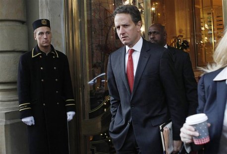 U.S. Treasury Secretary Timothy Geithner leaves a hotel in Frankfurt.