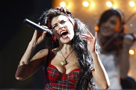 File photo of British singer Amy Winehouse performing at the Brit Awards at Earls Court in London File photo of British singer Amy Winehouse performing at the Brit Awards at Earls Court in London