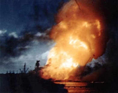 The USS Arizona is seen ablaze, immediately following the explosion of its forward magazines after the Japanese attack in Pearl Harbor, Hawa The USS Arizona is seen ablaze, immediately following the explosion of its forward magazines after the Japanese attack in Pearl Harbor, Hawa