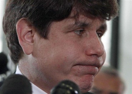 Former Illinois Governor Rod Blagojevich pauses during a brief speech to the media as he leaves the Dirksen Federal building after being con Former Illinois Governor Rod Blagojevich pauses during a brief speech to the media as he leaves the Dirksen Federal building after being con