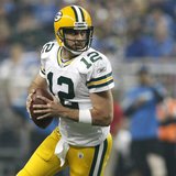 Green Bay Packers quarterback Aaron Rodgers looks for his receiver during the second half of their NFL football game against the Detroit Lio Green Bay Packers quarterback Aaron Rodgers looks for his receiver during the second half of their NFL football game against the Detroit Lio