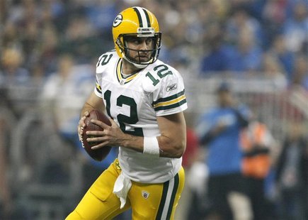 Green Bay Packers quarterback Aaron Rodgers looks for his receiver during the second half of their NFL football game against the Detroit Lio Green Bay Packers quarterback Aaron Rodgers looks for his receiver during the second half of their NFL football game against the Detroit Lio