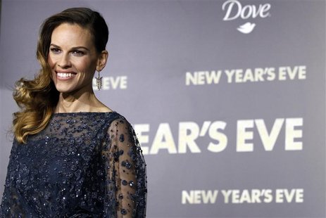 Cast member Hilary Swank poses at the premiere of "New Year's Eve" at the Grauman?s Chinese theatre in Hollywood Cast member Hilary Swank poses at the premiere of "New Year's Eve" at the Grauman?s Chinese theatre in Hollywood