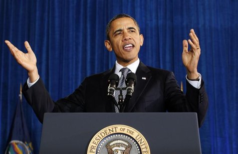 President Obama speaks about the economy and a payroll tax cut compromise at Osawatomie High School in Kansas President Obama speaks about the economy and a payroll tax cut compromise at Osawatomie High School in Kansas