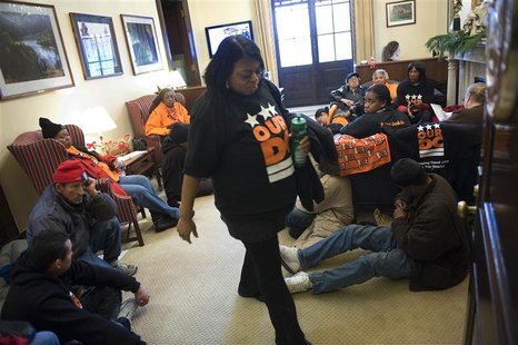 Protesters from the Occupy Wall Street gather for a sit-in in McConnell's office on Capitol Hill in Washington