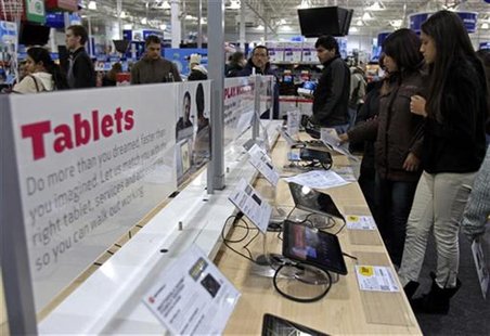 Shoppers look at tablet computers at a Best Buy Store on the shopping day dubbed "Black Friday" in Framingham Shoppers look at tablet computers at a Best Buy Store on the shopping day dubbed "Black Friday" in Framingham