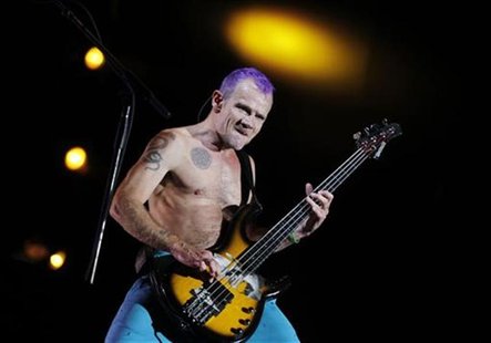 Red Hot Chili Peppers bassist "Flea" Balzary performs during their world tour at the National Stadium in Lima Red Hot Chili Peppers bassist "Flea" Balzary performs during their world tour at the National Stadium in Lima