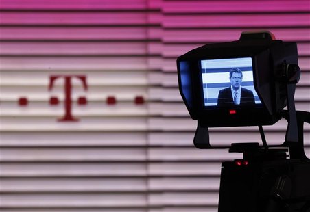 CEO of Deutsche Telekom Obermann is seen on a camera display during the annual news conference in Bonn CEO of Deutsche Telekom Obermann is seen on a camera display during the annual news conference in Bonn