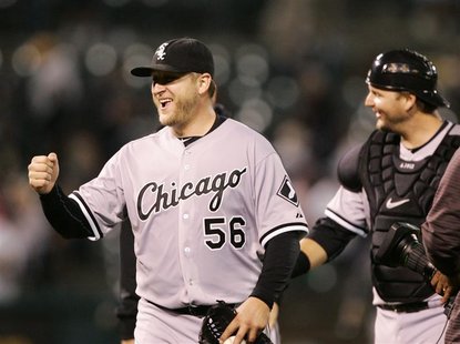 Chicago White Sox pitcher Buehrle and catcher Pierzynski celebrate beating the Oakland Athletics in their MLB American League baseball game Chicago White Sox pitcher Buehrle and catcher Pierzynski celebrate beating the Oakland Athletics in their MLB American League baseball game