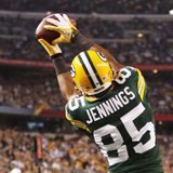 Green Bay Packers wide receiver Greg Jennings (85) catches a fourth quarter touchdown against the Pittsburgh Steelers during the NFL's Super Bowl XLV football game in Arlington, Texas, February 6, 2011. REUTERS/Mike Stone (UNITED STATES - Tags: SPORT FOOTBALL) Green Bay Packers wide receiver Greg Jennings (85) catches a fourth quarter touchdown against the Pittsburgh Steelers during the NFL's Super Bowl XLV football game in Arlington, Texas, February 6, 2011. REUTERS/Mike Stone (UNITED STATES - Tags: SPORT FOOTBALL)
